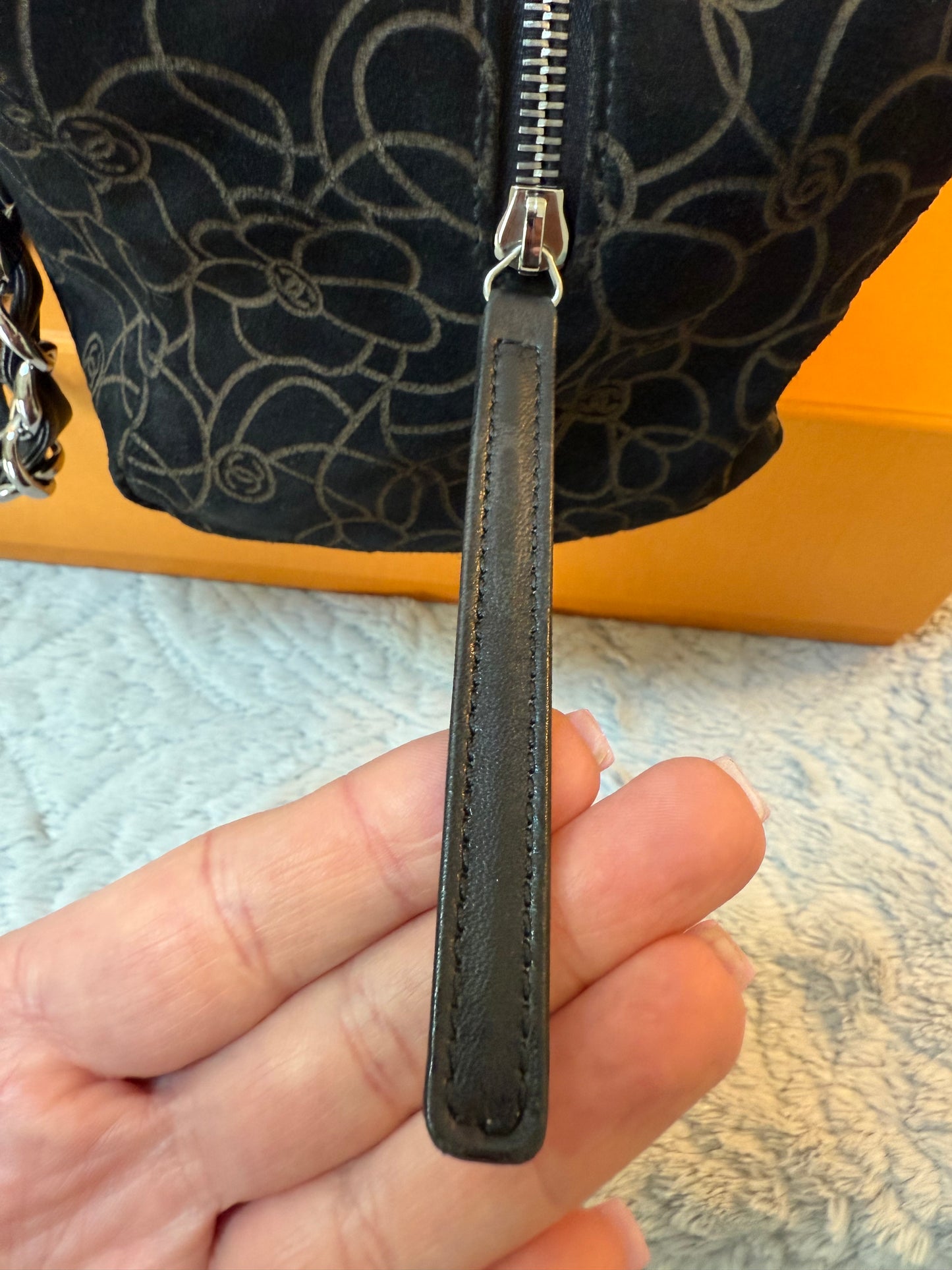 Chanel
Suede Camellia Bowler Bag