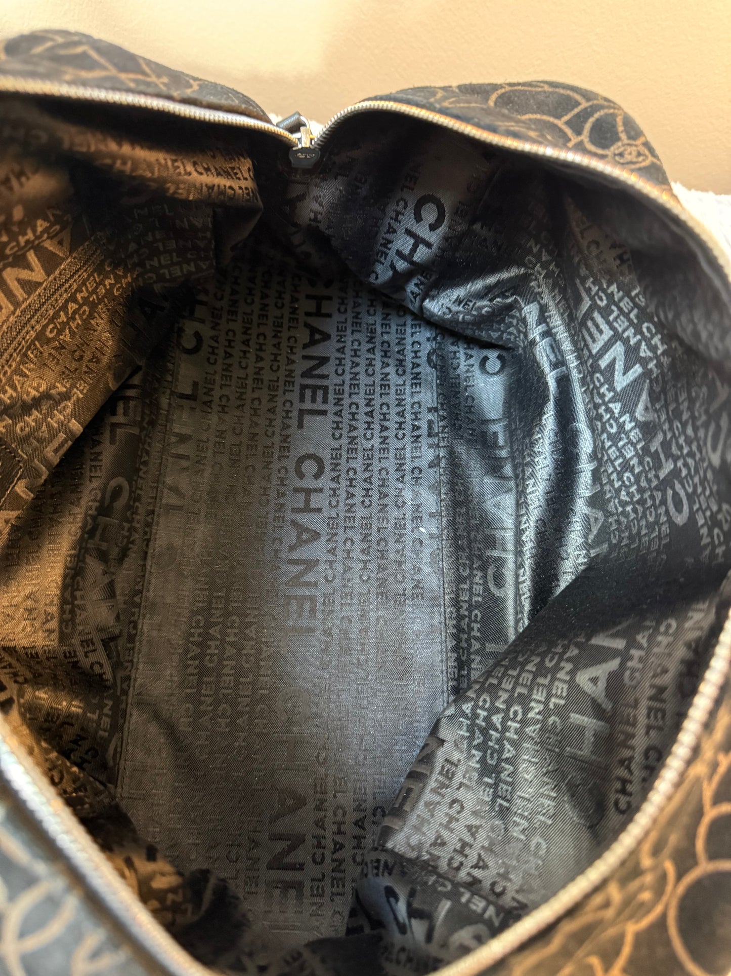 Chanel
Suede Camellia Bowler Bag
