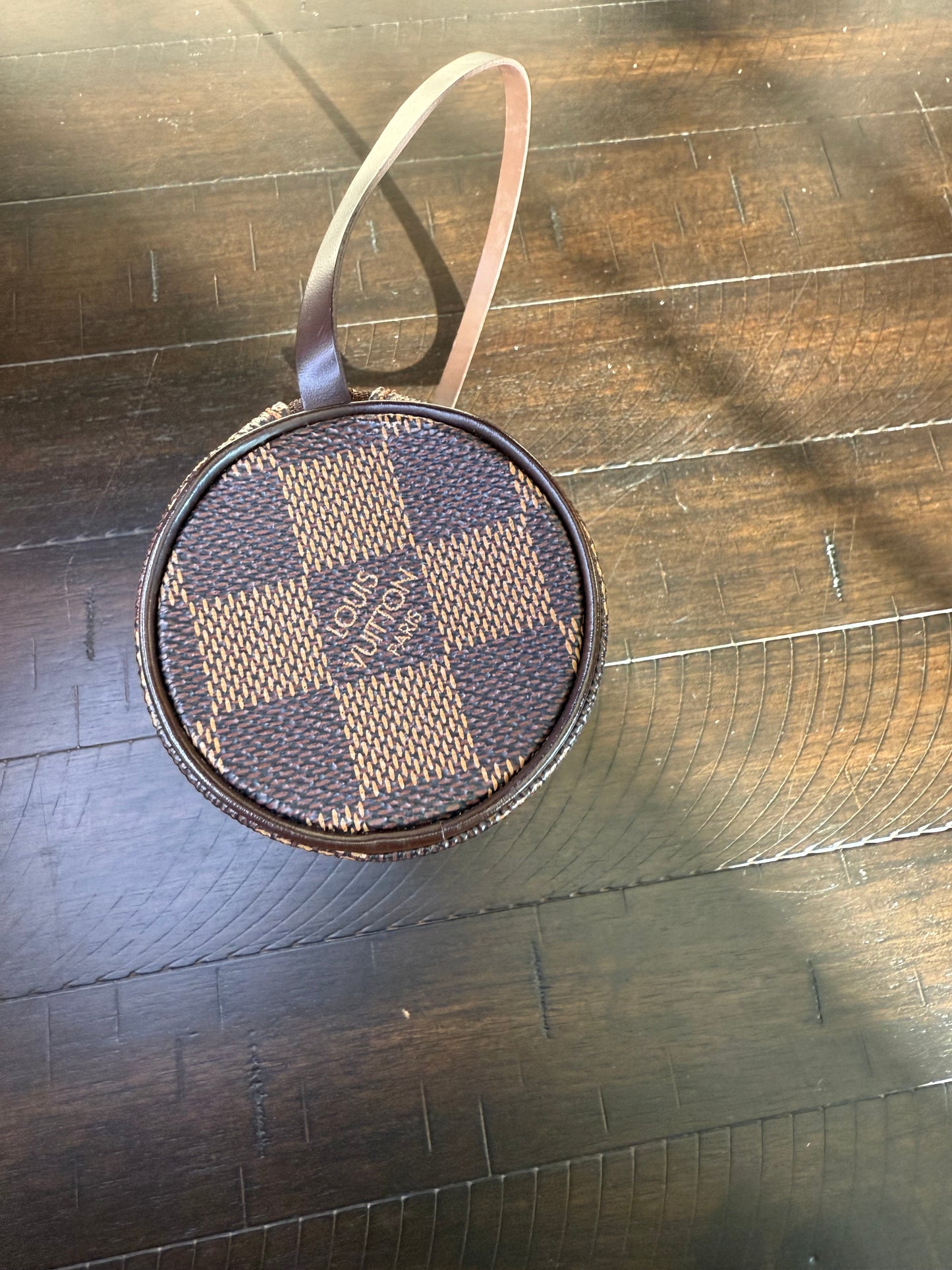 Louis Vuitton
Damier Ebene Papillon Pochette-would make a great gift!