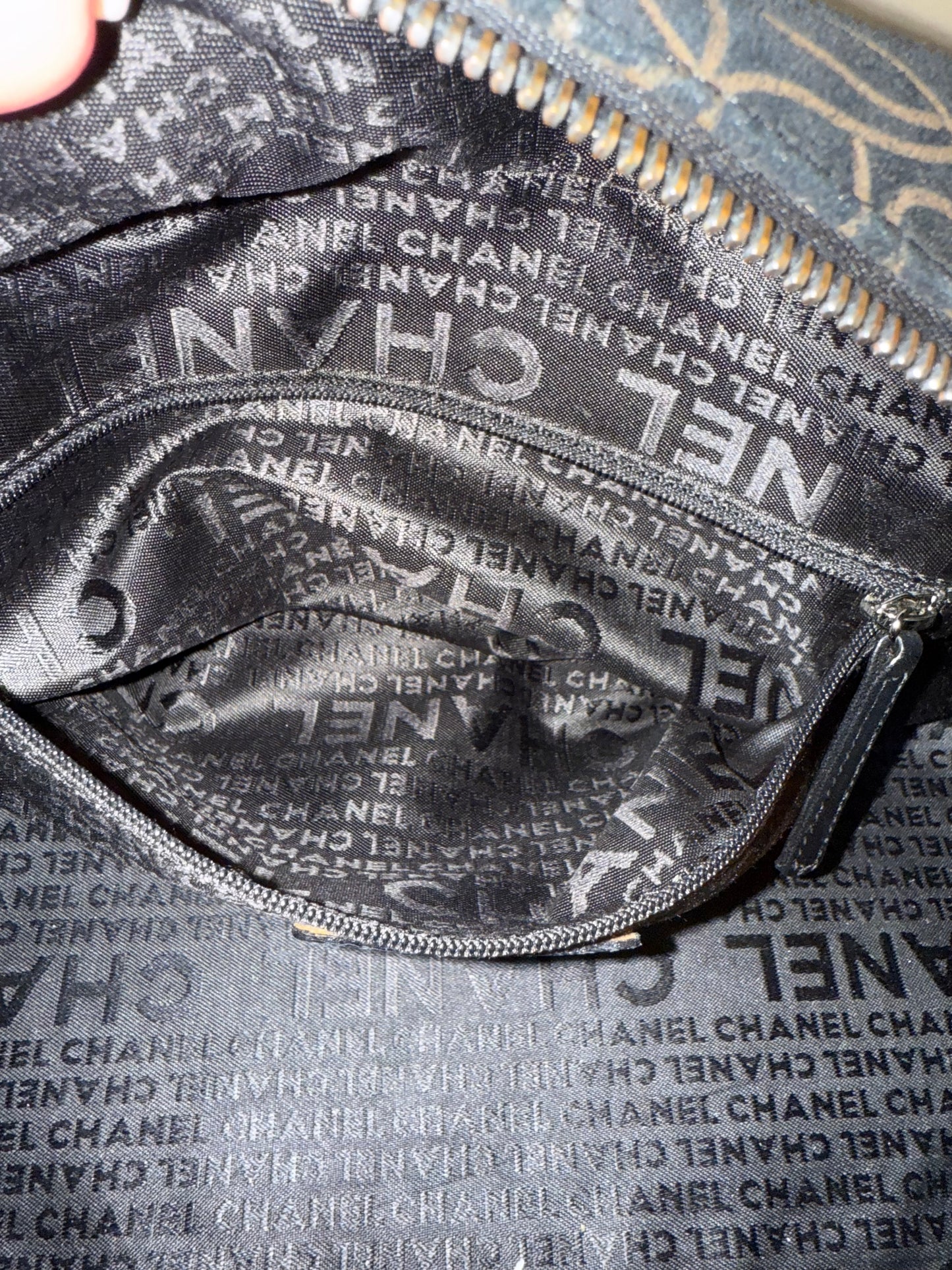 Chanel
Suede Camellia Bowler Bag