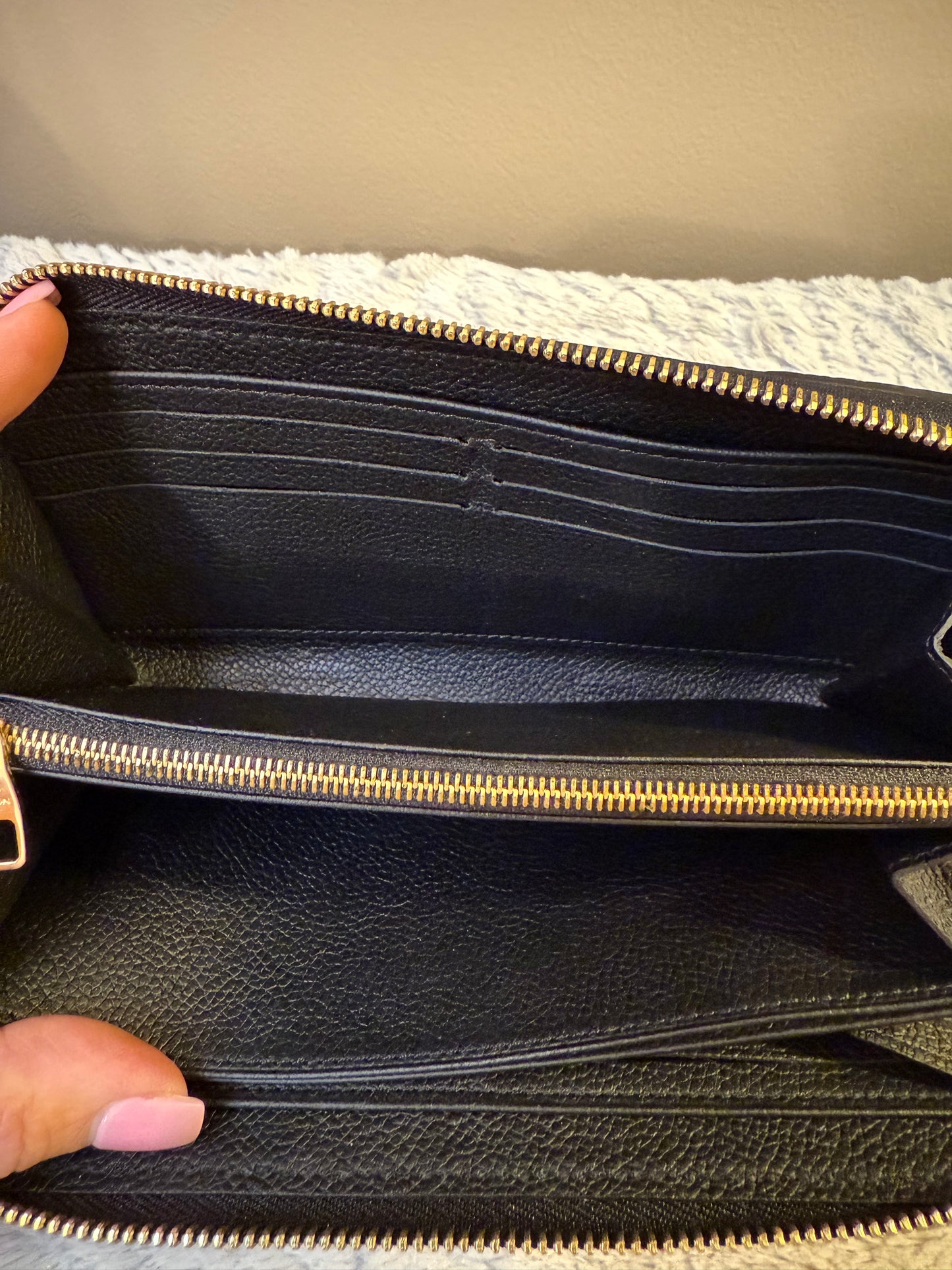 Limited Edition LOUIS VUITTON Crafty
Monogram Empreinte Zippy Wallet