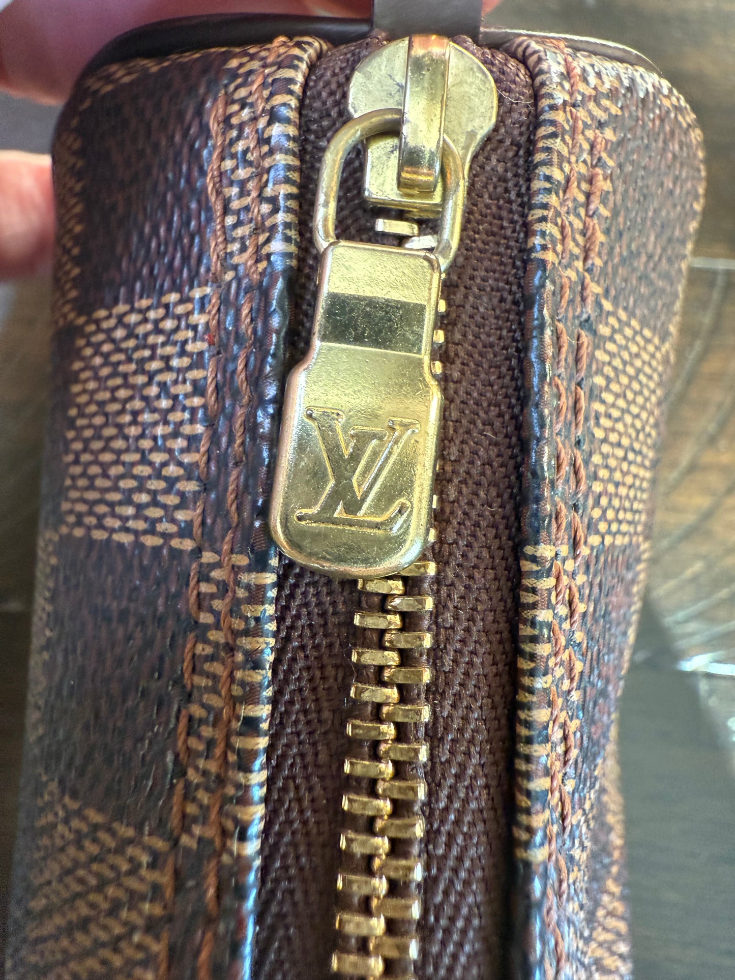 Louis Vuitton
Damier Ebene Papillon Pochette-would make a great gift!