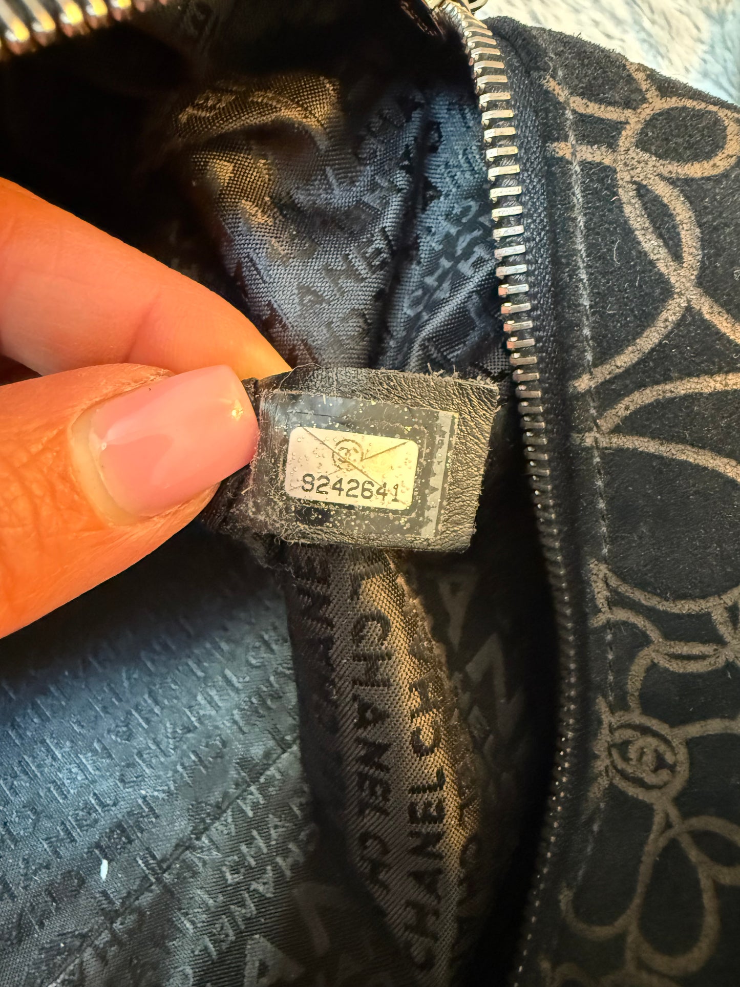 Chanel
Suede Camellia Bowler Bag