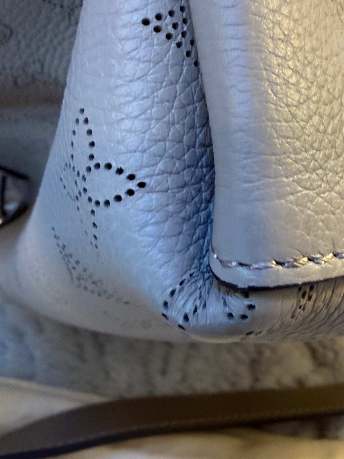 Louis Vuitton
Mahina Muria Bucket Bag