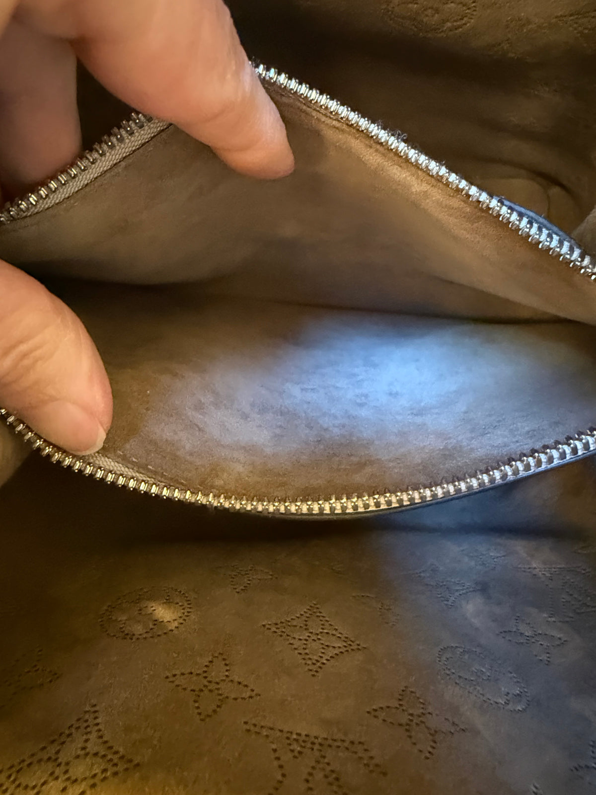 Louis Vuitton
Mahina Muria Bucket Bag
