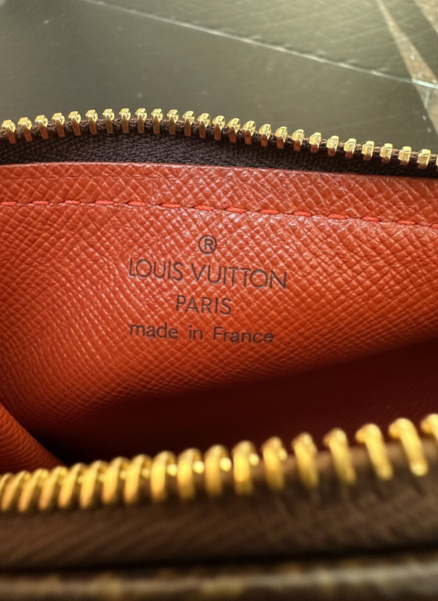 Louis Vuitton
Damier Ebene Papillon Pochette-would make a great gift!
