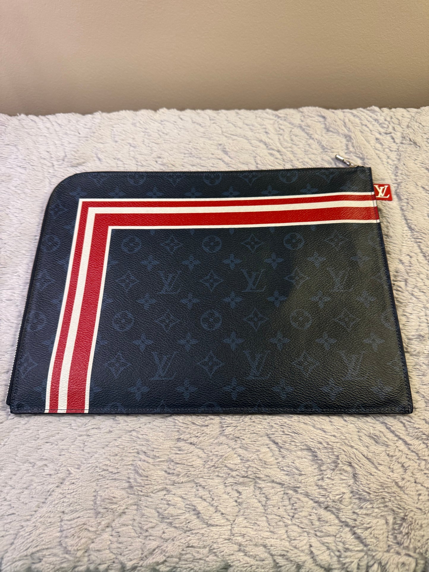 Louis Vuitton
Monogram Cobalt Pochette Jour GM- limited  edition
