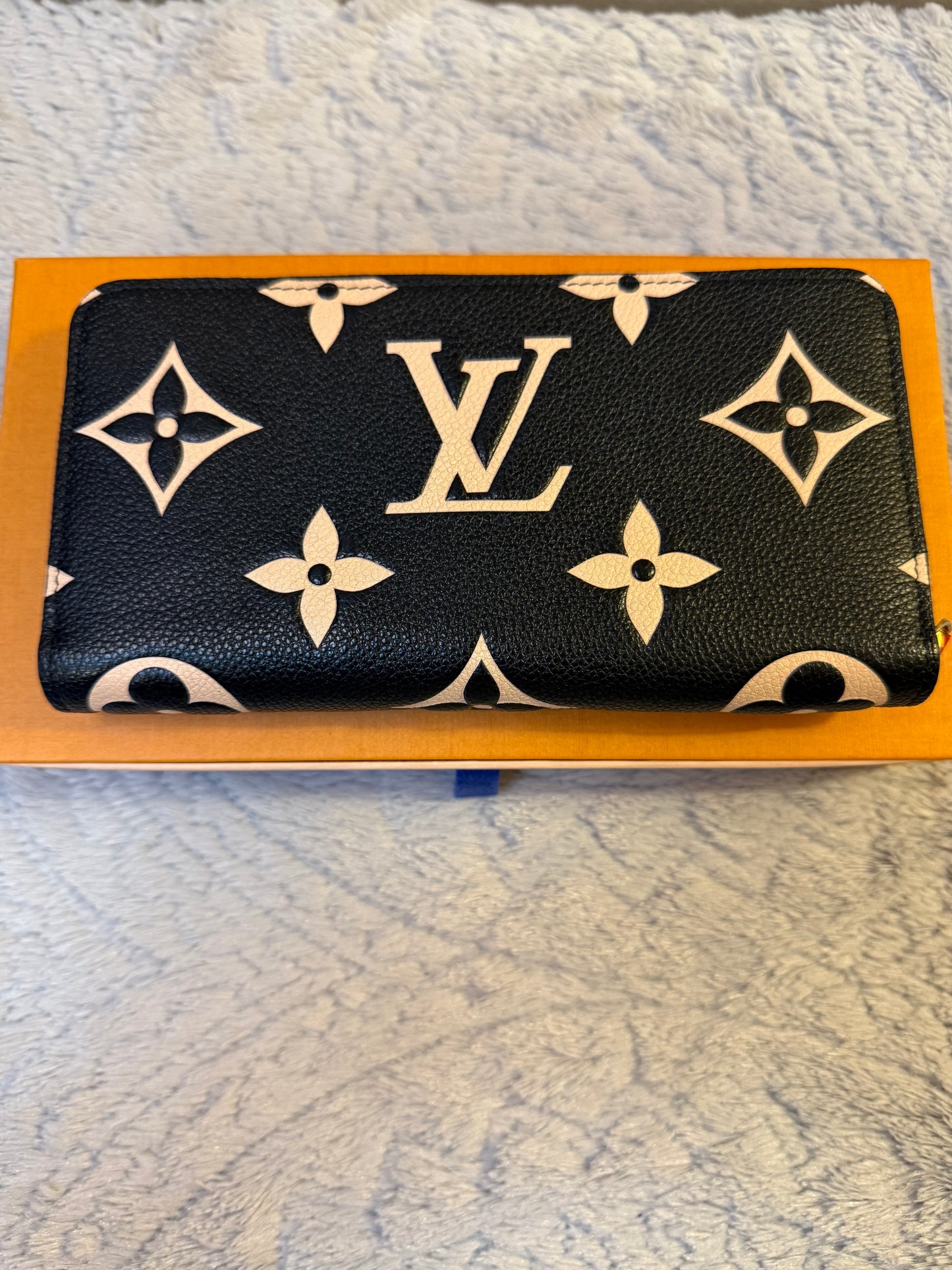 Limited Edition LOUIS VUITTON Crafty
Monogram Empreinte Zippy Wallet