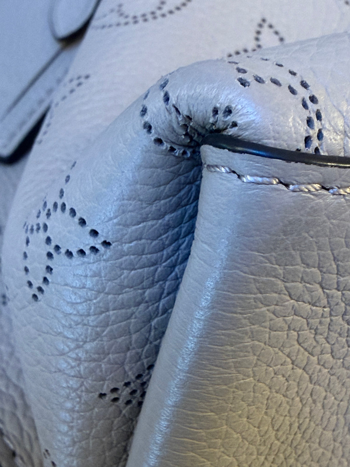 Louis Vuitton
Mahina Muria Bucket Bag